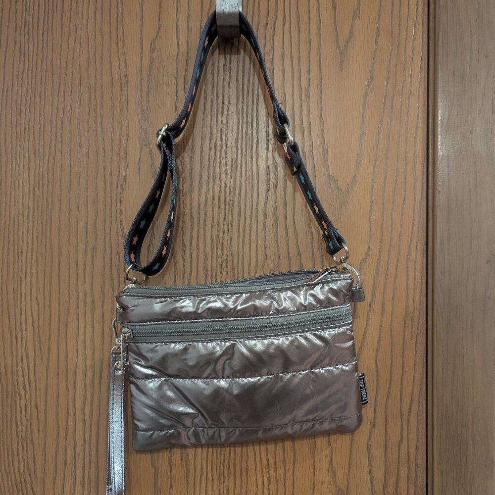Top Trenz Puffer Silver Cross Body Bag with Star Strap.